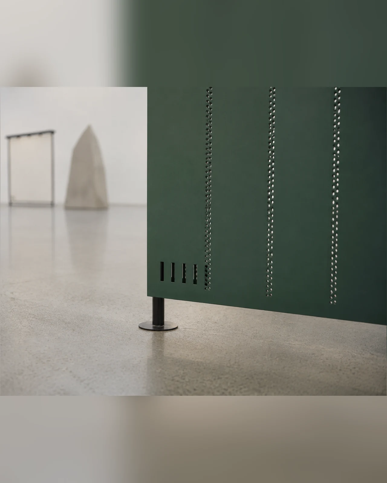 Surface: an AI-generated material study for fictional artist Eren Yori, with perforations in a deep green panel.